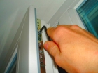 Регулировка фурнитуры одной балконной пластиковой двери