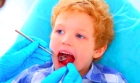 Удаление зуба у детей