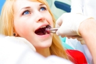 Удаление зуба (многокорневого)
