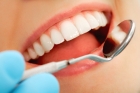 Восстановление зуба коронкой пластмассовой временной