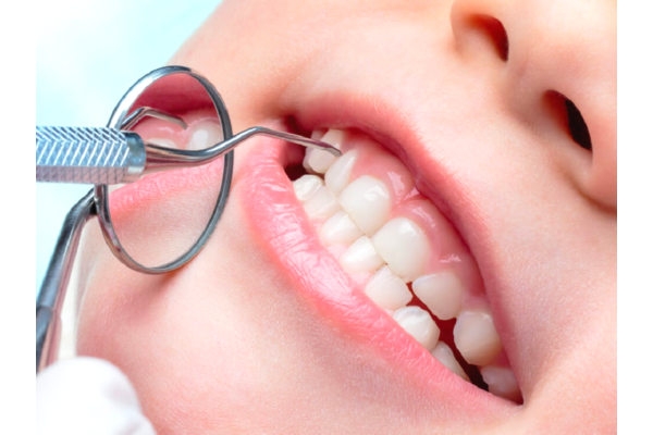 Лечение пульпита постоянного зуба (4 канала) + полная реставрация (2 посещение)