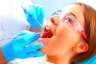 Хирургическое рассечение тканей около зуба мудрости