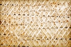 Штукатурка деревянных стен с предварительной обивкой дранкой или сеткой слоем до 3-х см