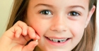 Удаление молочного зуба