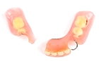 Приварка зуба к акриловому съемному протезу  (1 единица)