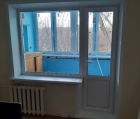 Установка пластиковых  окон с дверью на балкон
